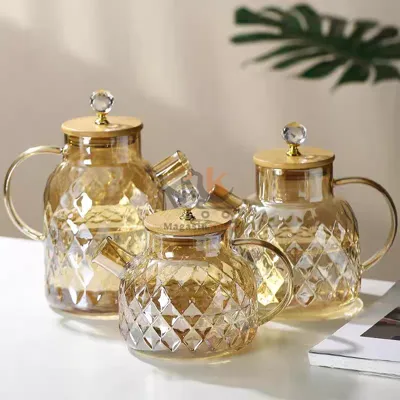 Théière en verre avec couvercle métal